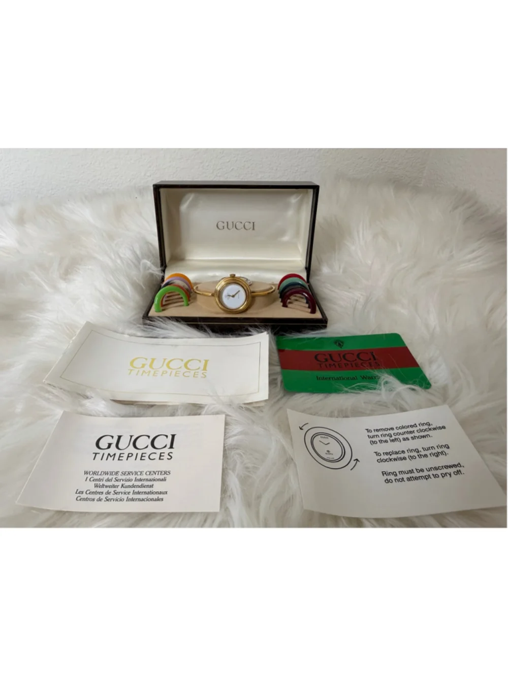 Vintage Gucci Interchangeable Bezel Bangle Watch, w/ 12 bezels, box & paperwork